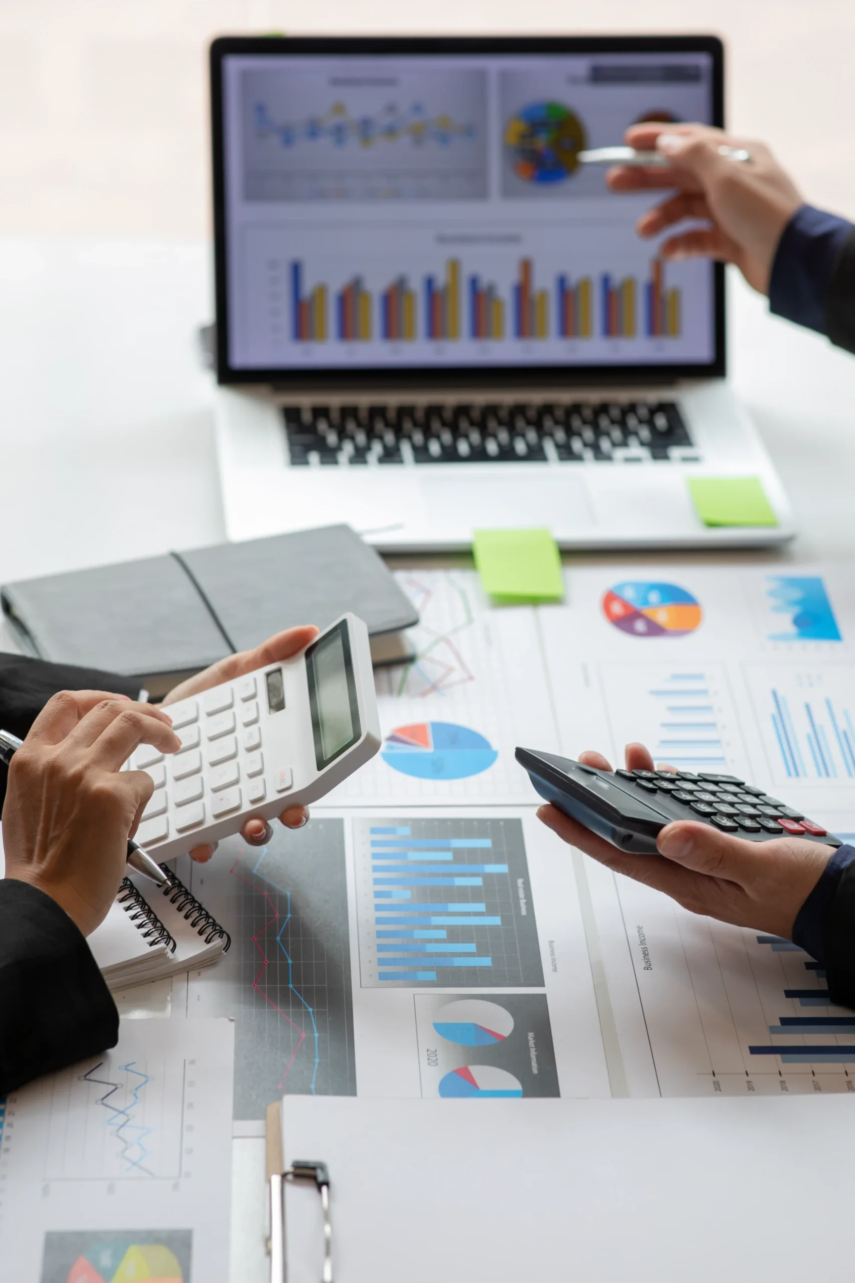 Teamwork with business people analysis cost graph on desk at meeting room. double exposure successful teamwork,business planning concept.